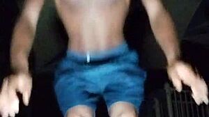 Black mature woman works out in gym dorm