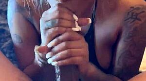 pretty ebony face says 'i love sucking big black cock'