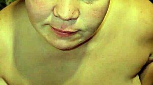 pissing in her mouth while admiring her big tits.