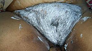 Hubby shaves desi housewife's pussy in homemade video