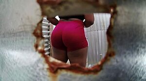 Amateur camera on a sexy Latina in the changing room of the beach