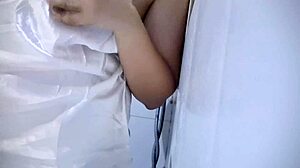 A chubby woman gets excited by playing with her tits