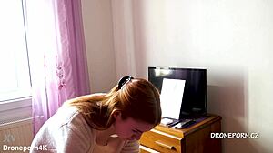 Karolinka, the cute Czech redhead, applies makeup naked