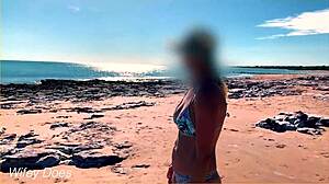 Look at wifey flashing her big tits at the beach!