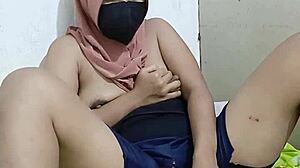 Hijab Teacher Masturbates with Big Breasts