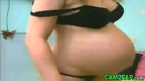 Blonde preggo beauty shows off massive boobs in steamy webcam session.