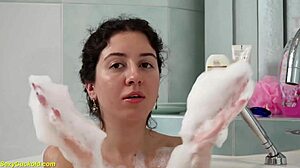 teen katty west teasing shaved cunt in bathtub