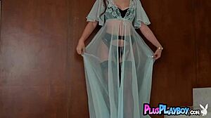 Lilly Bell strips naked in ripped lingerie, posing her big ass and tits.