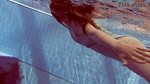 Sexy petite 18+ Russian teen Libuse shows small tits by pool