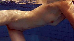 Sexy petite 18+ Russian teen Libuse shows small tits by pool