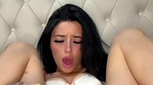 Is this horny American teen masturbating solo on webcam for you?