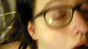 Belle tied down for throat use and domination