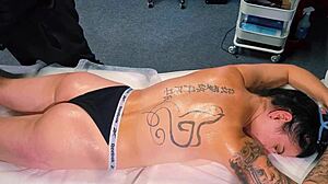 Male masseur gives tattoo girl a massage but she craves more