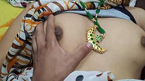 Indian Hot Sexy Aunty in Saari Shows Big Boobs and Ass for Bhabhi Chudai.