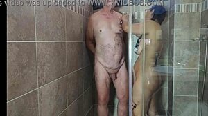 Hot sexy babe shaves in shower, giving jerk off instructions with big natural tits close up.