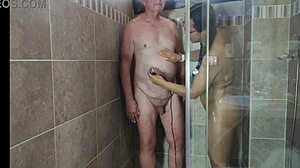 Hot sexy babe shaves in shower, giving jerk off instructions with big natural tits close up.