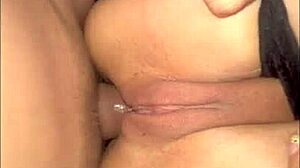 beautiful ebony woman squirts with a toy in her narrow ass