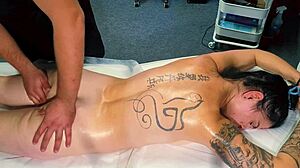 Male masseur gives tattoo girl a massage but she craves more