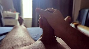 She's masturbating in the bedroom with sun rays shining through the window