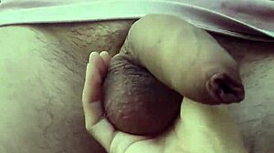 She plays with dick drool then gets cum bathed