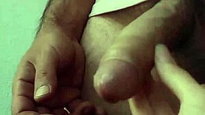 She plays with dick drool then gets cum bathed