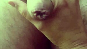 She plays with dick drool then gets cum bathed