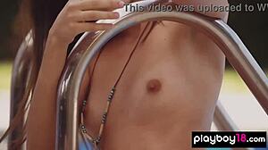 petite teen 18+ katrine pirs strips naked in outdoor pool