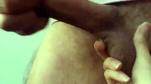 She plays with dick drool then gets cum bathed