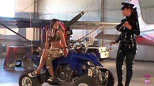 Amazing lesbian friends fuck with strap on in warehouse