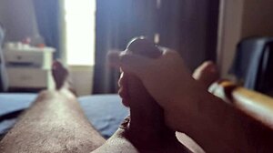 She's masturbating in the bedroom with sun rays shining through the window