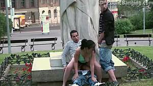 Cute Teen 18+ Girl Fucked by 2 Guys in Public in Center of the City by Famous Statue
