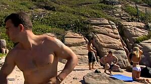 Beach gangbang features anal drilling and orgasms in outdoor orgy with slut getting banged