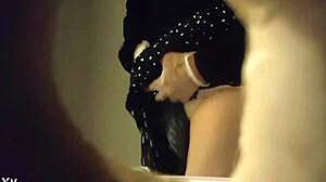 Hidden cam catches babe peeing in white panties through wall hole