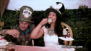 Tea party in cosplay turns intriguing foursome with blowjobs on big cocks in Wonderland.