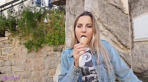 cute blonde milf walking outdoors with vibrator