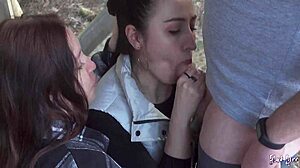 Sucking his huge cock together on our outdoor vacation threesome.