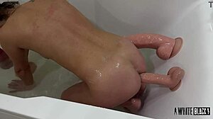 master trains submissive anal slave to work tight holes with giant dildos