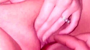 hannah, a beautiful girl, displays her big tits and boobs in this video