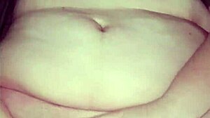 hannah, a beautiful girl, displays her big tits and boobs in this video