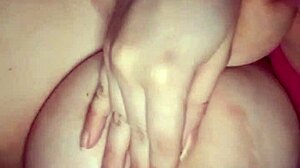 Amateur sucks her big natural tits