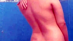 A hidden cam catches a cute wife masturbating in the bathroom, her big tits bouncing on webcam