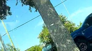 just a girl fixing her sports bra in the gym parking lot