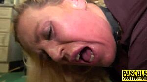 belted woman in bondage gets restrained