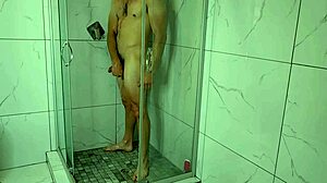 Morning shower blowjob—skinny milf gags on cum. Want to watch her saggy tits get wet?