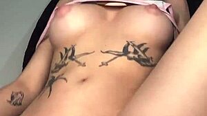 this young girl is masturbating alone exploring her body with anal touches