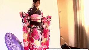 Japanese geisha gets tied up and played with her ass and pussy.