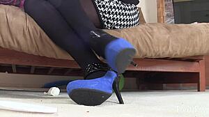 Beautiful latina patient shows off suede shoes in doctor's office