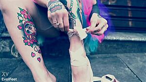 ballerina in ballet shoes walks down the street