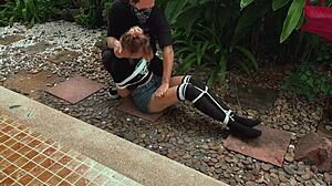 I punished her by tickling her feet outdoors