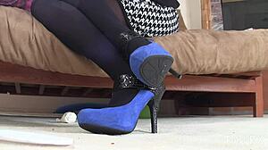 Beautiful latina patient shows off suede shoes in doctor's office